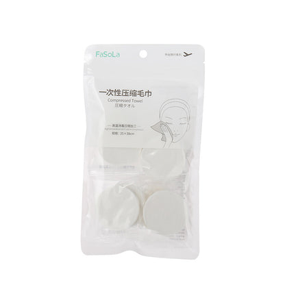 Disposable compressed towel
